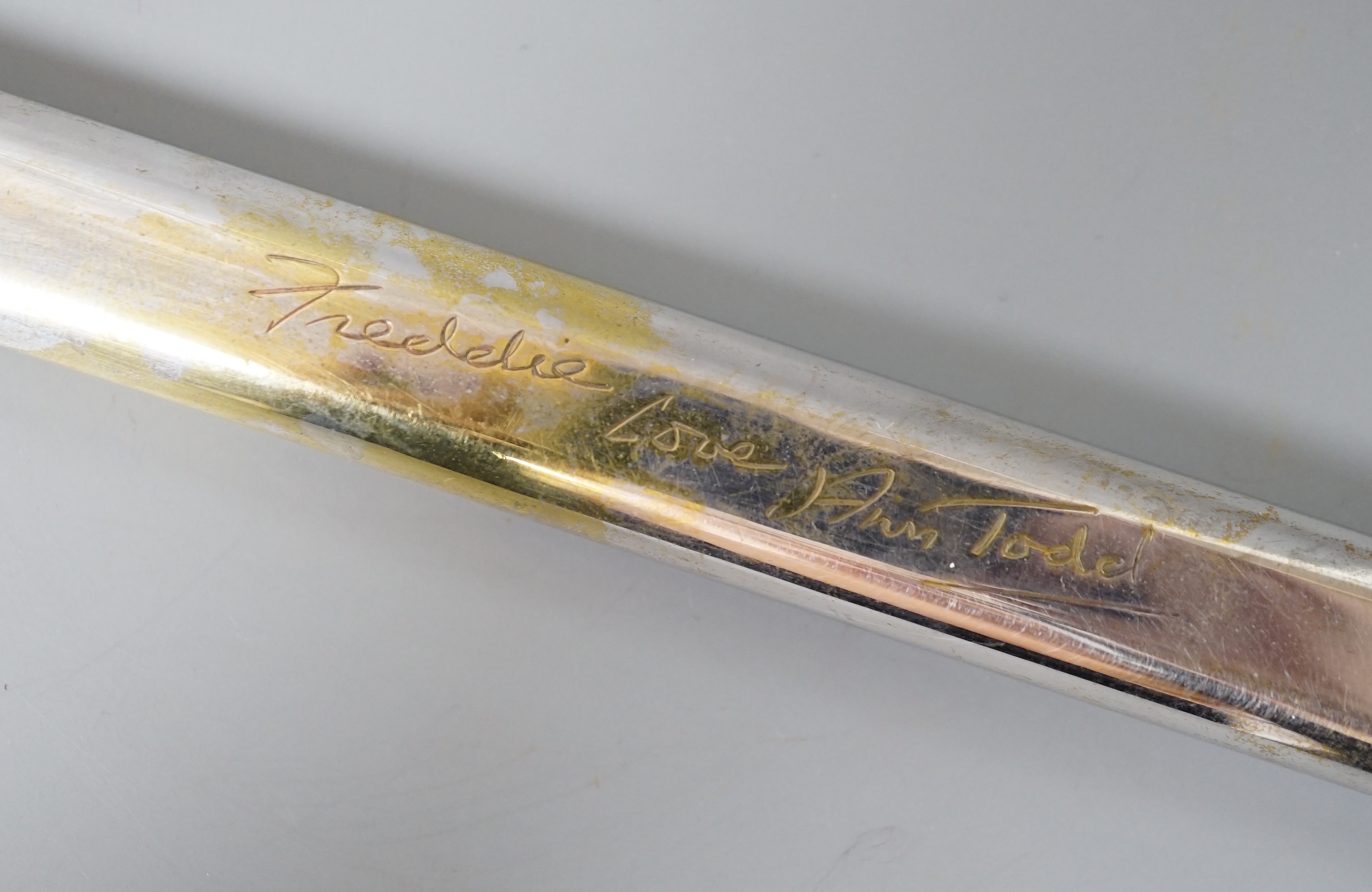 A silver plated novelty Dunhill ‘ruler’ lighter, inscribed by the actress Ann Todd, 16.5 cms long.